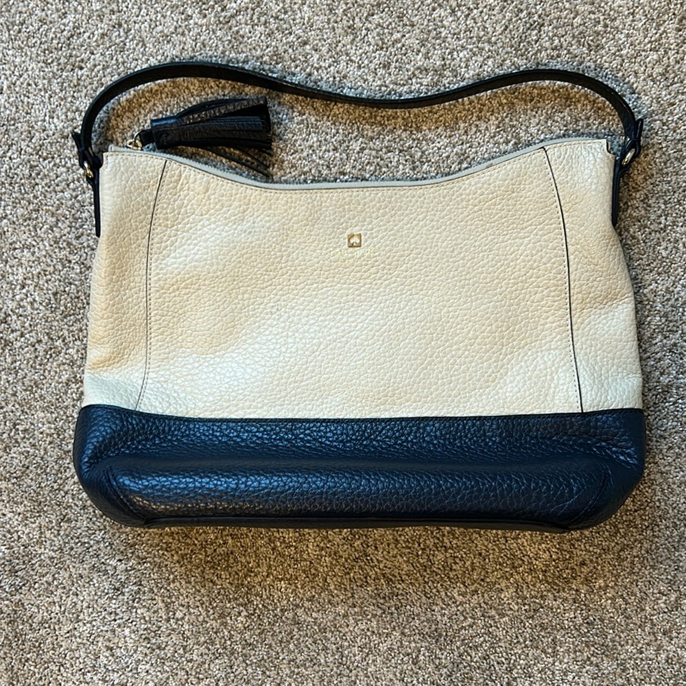 Navy and cream Kate Spade purse.